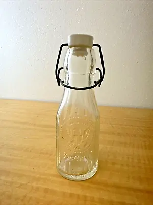 Vintage American Eagle Glass Bottle 1967 With Wire Bail And Ceramic Stopper • $15