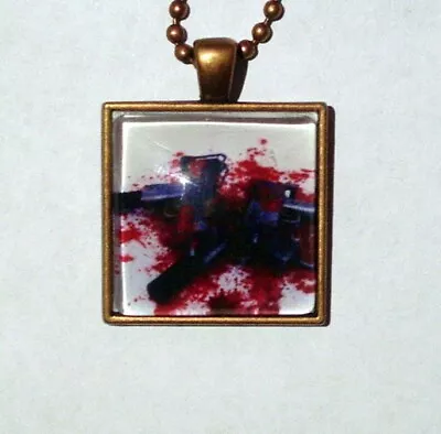 Pendant -- Guns MAC-10's And Blood Glass Cabochon Amulet Talisman • $2.99