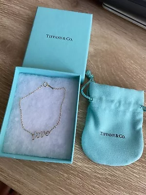 Women’s Tiffany & Co Love Bracelet  • $250