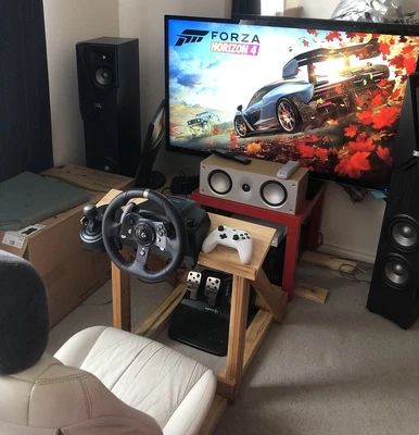 $130 • Buy Xbox One S + Games & Racing Frame