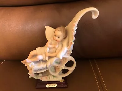 Vintage  Baby's First Ride  Capodimonte Figurine On A Wooden Stand • $16