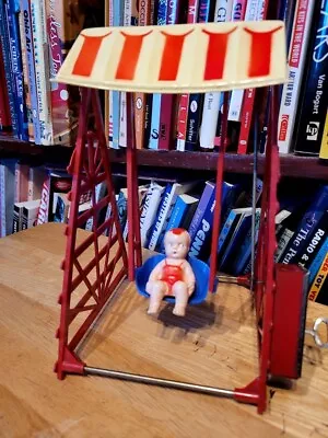 NICE VINTAGE 1950's IRWIN PLASTIC WIND UP SWING WITH BABY CHILD • $26.95