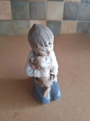 NAO BY LlADRO FIGURINE OF A  BOY KNEELING DOWN HOLDING A PUPPY 14 CM TALL • £5.50