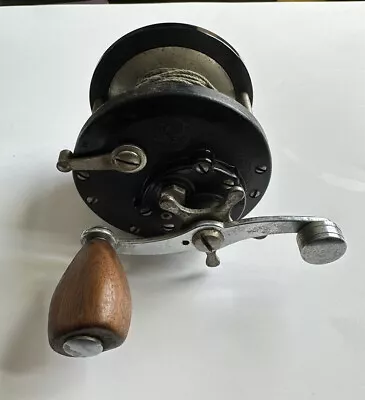 Vintage Penn 85 Brown Wood Handle Bait Caster Level Wind Fishing Reel Works • $29.99