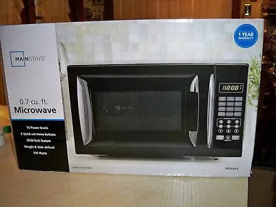 Mainstays 0.7 Cubic Foot Microwave Oven • $50