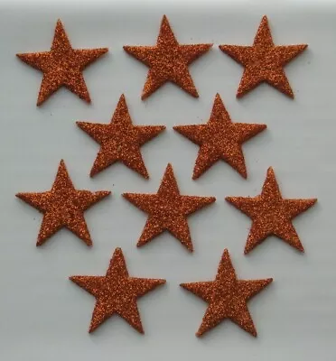 10 X EDIBLE ORANGE GLITTER STARS. CAKE DECORATIONS. LARGE 4cm. • £3.60