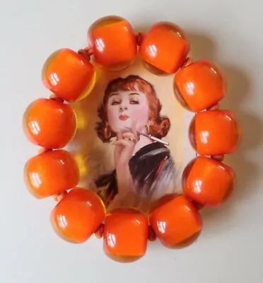 **Hand Crafted Zsiska Orange Sparkle Resin Bead Stretch Bracelet • $40