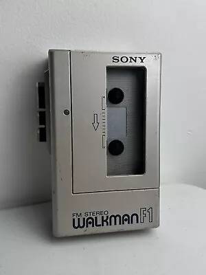 Vintage SONY WALKMAN WM-F1 FM Stereo Cassette Player  - Radio For Parts Silver • $62.18