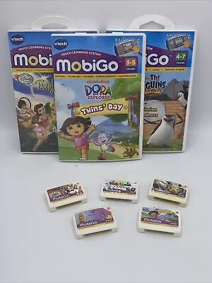Vtech MobiGo Learning System Game Lot Of 5 - Dora Penguins Tangled Fairies ++ • $25.99