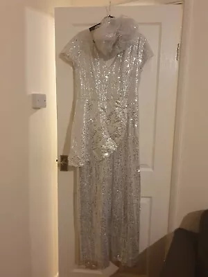 £25 • Buy Silver Squin Jumpsuit & Fasanatior Size 12-14
