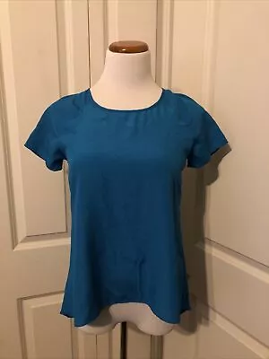 MM Couture Sexy Back Solid Blue Short Sleeve High Low Blouse Size XS • $15.95