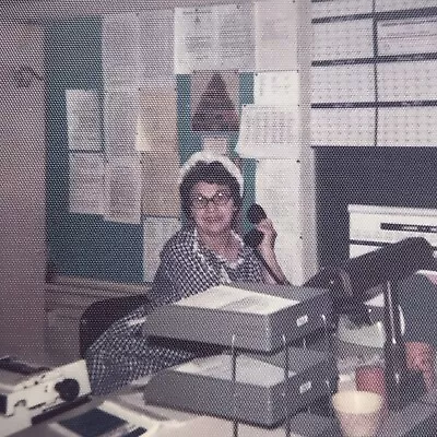  Vintage Color Photo Woman Sitting At Desk Office Holding Phone Papers Files  • $6.69