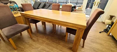 £350 • Buy Mantis Light Natural Solid Mango Dining Table