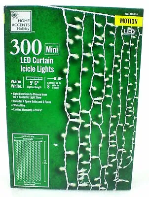 Home Accents Holiday 300 Mini LED Curtain Icicle Lights Motion Warm White 5' 6  • $34.95