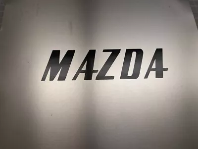 2 Pack- 1950's Mazda Logo Gloss Black Vinyl Decal Sticker 7  X 1.75  • $8.50