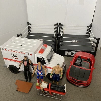 £44.99 • Buy Large WWE Bundle 4x Figures, 2x Rings, Slambulance And Wrekin Car