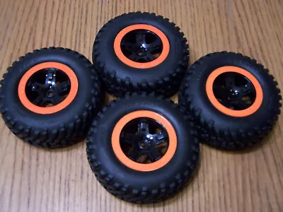 Fits Traxxas 1/10 Slash 4x4 Spec Tires Black Solid Spoke Wheels Orange Ring 12mm • $36.82