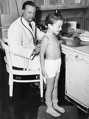 Pediatrician Doctor Listening With A Stethoscope 1959 Old Photo • $9