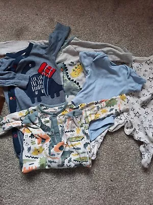 1. First Size Baby Clothes Bundle.  Boys Dinosaur Sleepsuits And Vest • £1.50