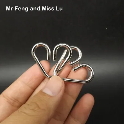 Mini Heart Ring Puzzle Metal Wire Toys Brain Teasers Intelligence Gadget Magic • $0.99