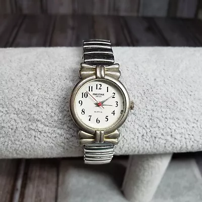 Vintage PRESTIGE SWISS Women's Watch Silver Tone Stretch Band NEW BATTERY • $24.45