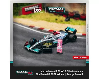 Tarmac Works Mercedes-AMG F1 W13 E Performance Sao Paulo GP 2022 G Russell 1/64 • $16.99