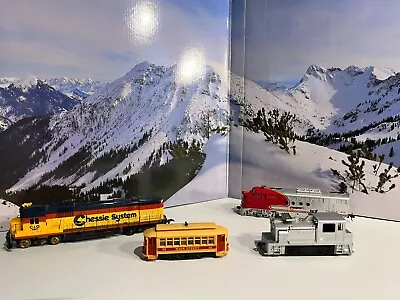 4 HO Scale Locomotives/trolley From Various Manufacturers. • $40