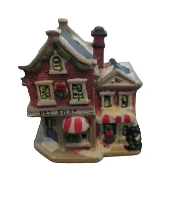 Wellington Square Christmas Village Pet Shop Ceramic Holiday Village Decor 2005 • $14.99