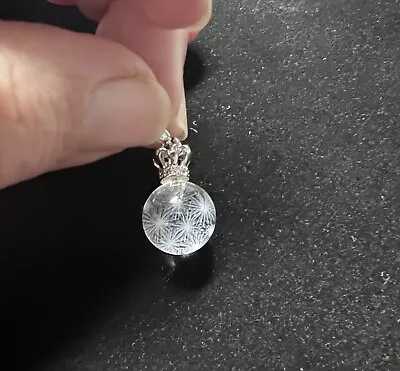 Sphere Pendant With Dandelion Seed Shapes Inside • £5.48