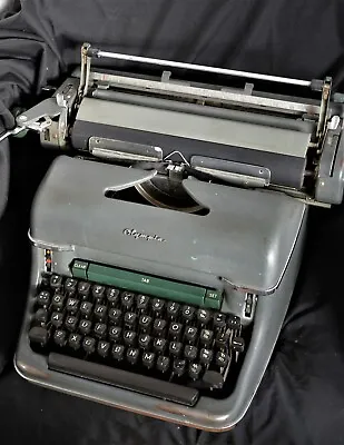 Olympia Deluxe Typewriter. • £95