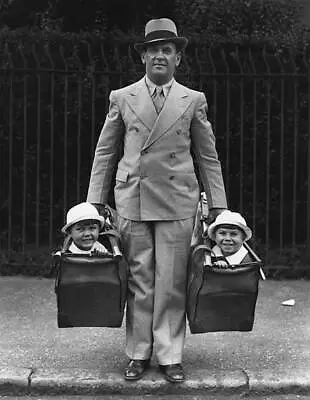 Man Carrying Twins Who Are Part Of A Circus Act 1935 Movie OLD PHOTO • $9