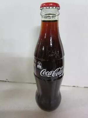 Coca Cola Bottle.  250ml Coca Cola Glass Bottle With Red Cap. • $7.50