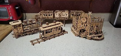 DISNEY Ugears Built Monorail Small World Train Trolley Working Lot Of 4 Sets  • $125