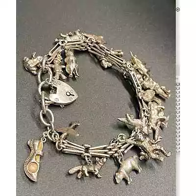Sterling Silver Vintage English Charm Bracelet • $369