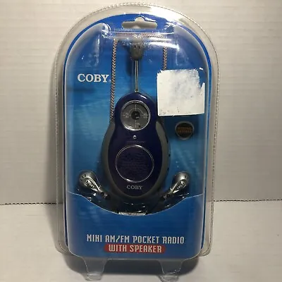 Coby Mini AM/FM Blue Pocket Radio CX-8-NEW-With Speaker Head Phones Sealed 2003 • $15