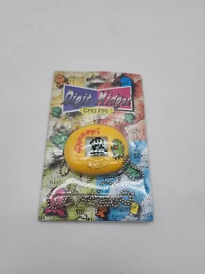 Gyaoppi Yellow Virtual Pet Vintage 1997 • $42.46