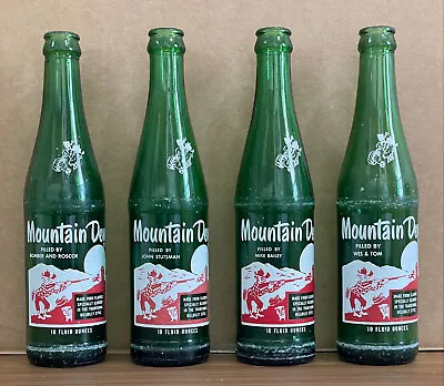 Lot Of 4 Vintage Mountain Dew Bottles W/ Unique Names Under The Word “Mountain” • $45