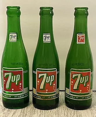 Three Vintage 7 Up  7oz Bottles 1956 1962 1964 • $15