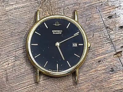 Vintage Seiko MENS Slim Quartz Gold Black Dial Dress Date Watch 5Y39-7010 Works • $64.99