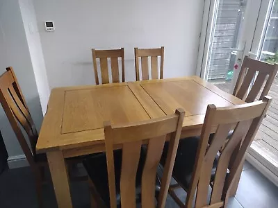 Used Extendable Oak Dinning Table And 6 Chairs Oak Furniture Land  • £250