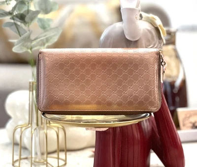 $350 • Buy GUCCI Metallic Microguccissima Zip Around Heart Pink Wallet