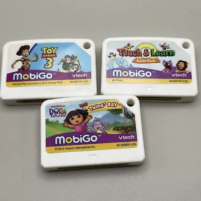 Vtech Mobigo Games Lot Of 3-Dora Twins’ Day-Touch And Learn-Toy Story 3 • $7.99