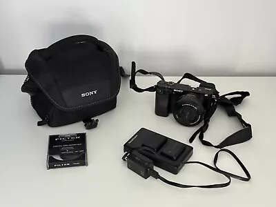 Sony A6000 24.3 MP Mirrorless Digital SLR Camera - Black (BUNDLE) • $400