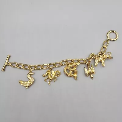 Vintage Animal Charm Bracelet Gold Tone Snake Dragon Bird Duck Elephant 7  • $29.99