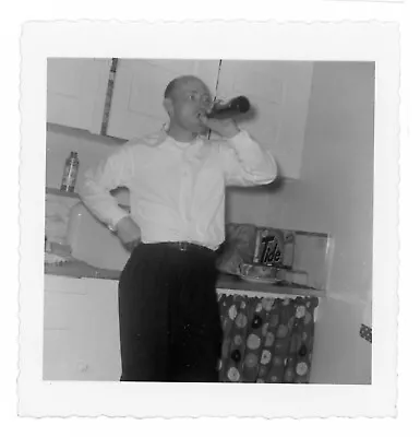 Vintage Photo Man In Kitchen Drinking A Beer After A Hard Days Work Candid • $9