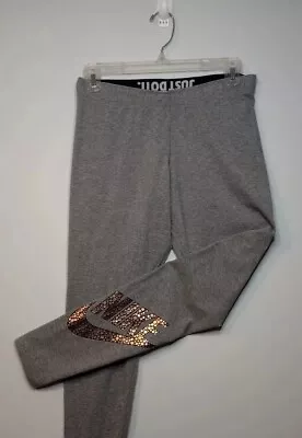 NIKE Metallic Foil Bronze Logo Leggings Yoga Pants Grey Womens Size M Medium NEW • $14.99
