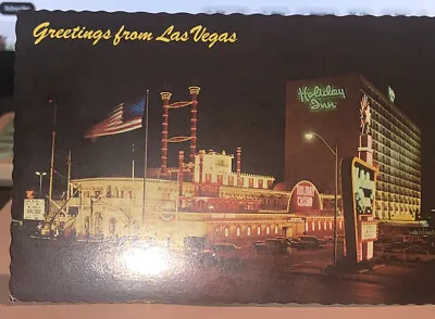 POSTCARD  GREETINGS FROM LAS VEGAS HOLIDAY INN ON THE STRIP  Las Vegas News • £5.85