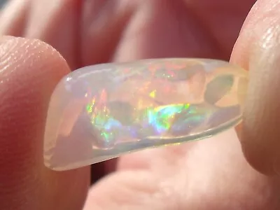 4.72 Carats. Contra Luz Carved Fire Mexican Opal • $110