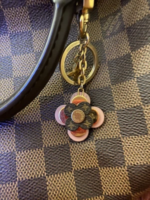 $355 • Buy LOUIS VUITTON Bag Charm Key Chain Porte Cles Blooming Flower M63085
