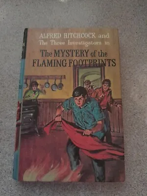 The 3 Investigators -The Mystery Of The Flaming Footprints -Collins Short Ed. HB • $39.14